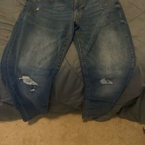 Distressed Blue Jeans
